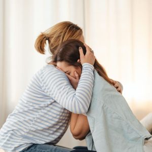 image - A mother comforts her young daughter - Free Seminar - Understanding self harming behaviour in kids